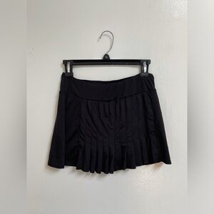 black pleated mini tennis skort